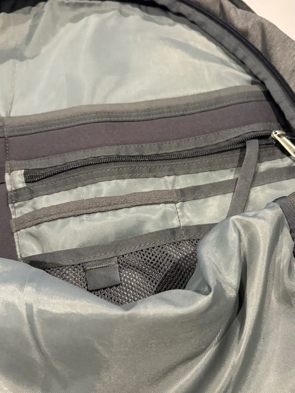 The North Face - Borealis Backpack with blue bungee cords.
